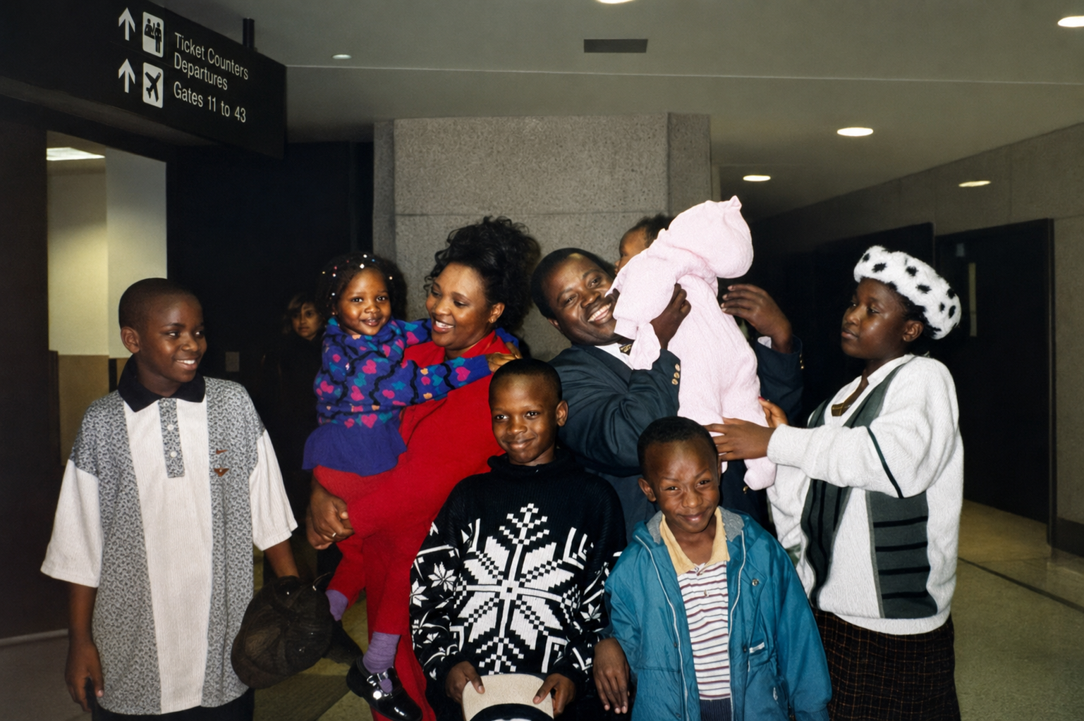 Henriette and her family arriving at JFK airport in the United States